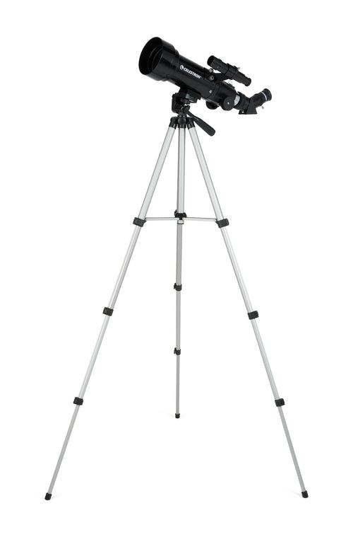 Black Celestron Travel Scope 70mm Portable Telescope side on with  silver tripod at full height
